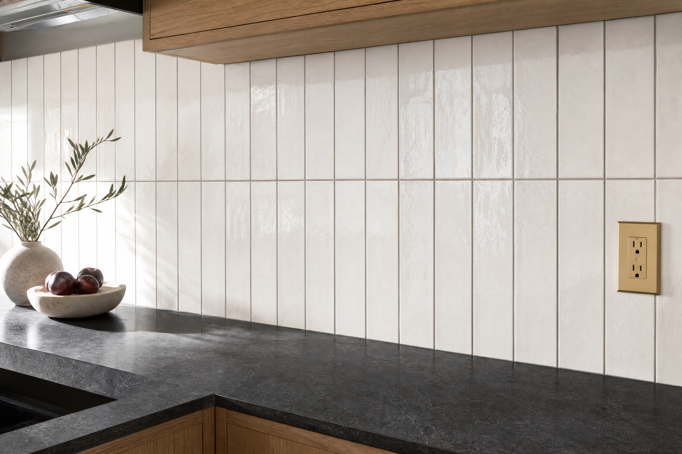 Precisely aligned white ceramic tile kitchen backsplash